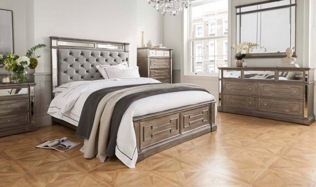 lavish_ Elegant bedroom with an Ophelia Bed - 5' Kingsize, matching wooden furniture, and a herringbone wood floor designed for contemporary home decor.
