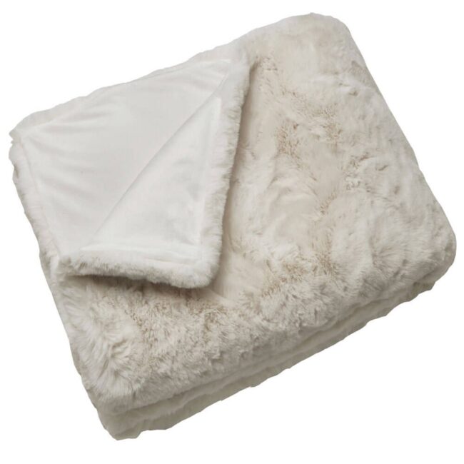 lavish_ A folded beige Rapture White Faux Fur Throw with a white lining on a southport interior design-inspired white background.