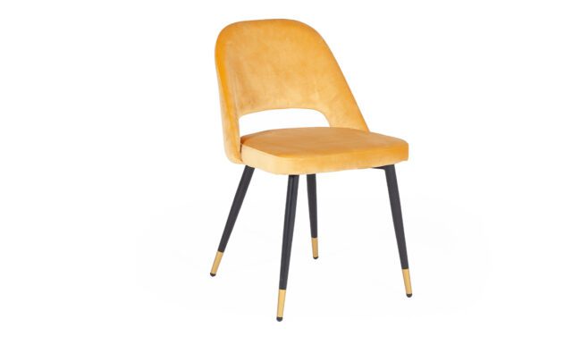 lavish_ A Brianna Dining Chair Mustard with a yellow velvet seat and black metal legs with gold tips.