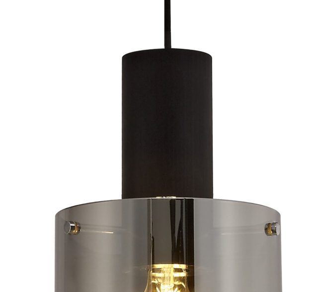lavish_ Close-up view of a Bonnie Single Pendant with a cylindrical black shade and a transparent outer cover, perfect for Southport home decor.