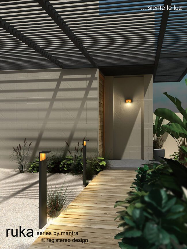 lavish_ A modern outdoor lighting advertisement showcasing elegant pathway lights and a wall-mounted Ruka Floor Lamp Large in a serene garden setting at dusk, perfectly complementing contemporary home decor.