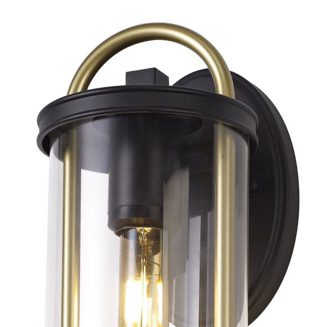 lavish_ Finley Small Wall Lamp with a clear glass cover, metallic accents, and inspired by Southport home decor.