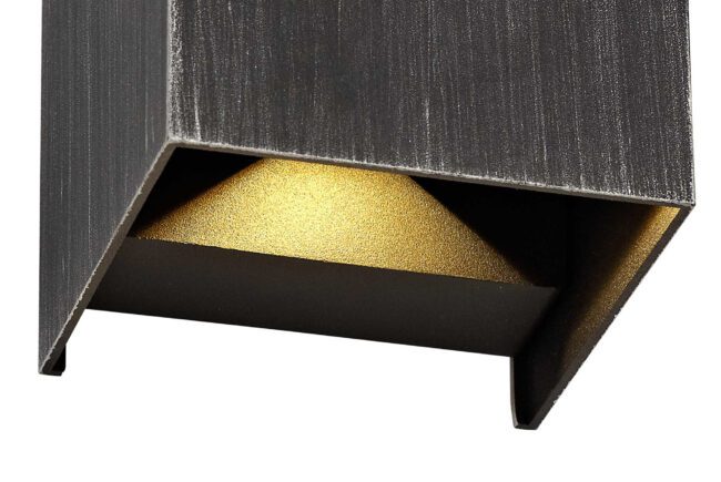 lavish_ Close-up of a textured metal angle profile with a gold interior finish, perfect for the Harry Up & Downward Lighting Wall Lamp home decor.