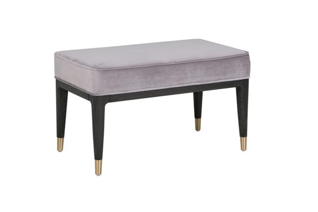 lavish_ A modern Diletta dressing stool with an ebony ecru velvet top and black wooden legs with gold tips.