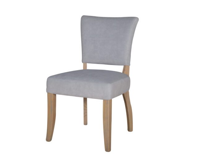 lavish_ A gray upholstered Southport dining chair with wooden legs.