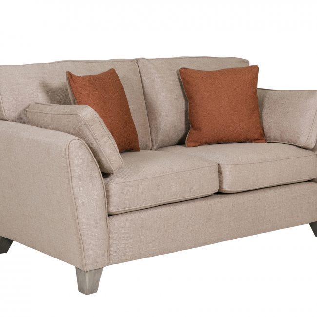 lavish_ A contemporary loveseat with beige upholstery and two brown accent pillows enhances your Southport home decor.