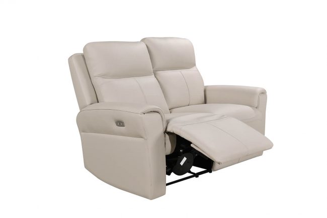lavish_ Beige leather reclining loveseat with extended footrest, perfect for Southport interior design.