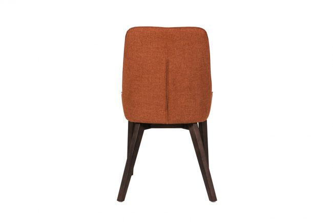 lavish_ Axton Dining Chair - Rust with a rust-colored upholstered backrest and dark wooden legs, isolated on a white background.