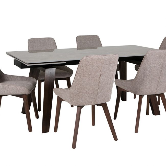 lavish_ A modern dining set with one Axton 1800/2600 Dining Table Latte and six beige upholstered chairs on a white background.