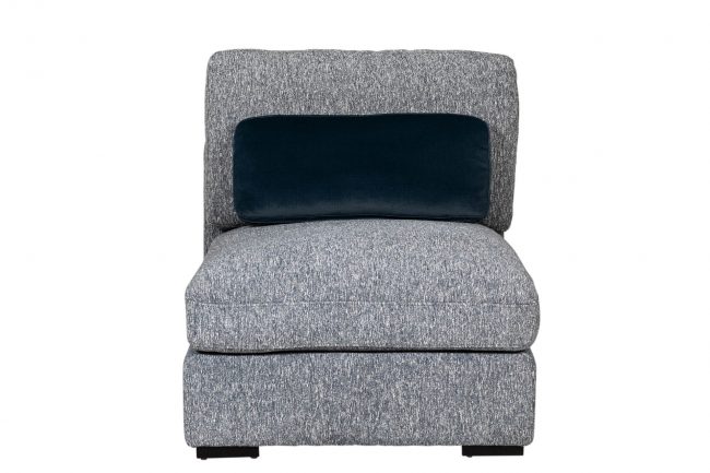 lavish_ Single gray fabric armchair with a dark blue cushion against a white background.