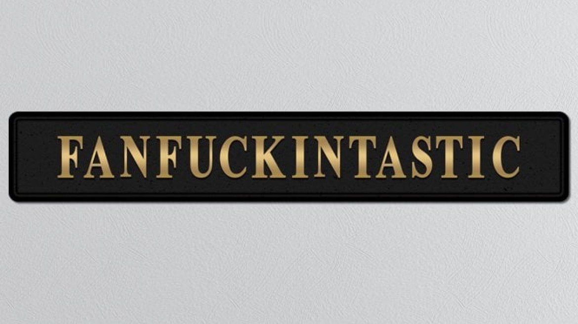lavish_ A plaque with the word "fanfuckintastic" on a BLACK FANF**KINTASTIC GOLD FOILED SIGN.