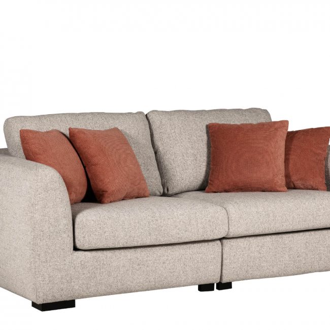 lavish_ A beige upholstered Spencer 4 Seater Natural with two seat cushions and four rust-colored throw pillows. The sofa has black square legs.